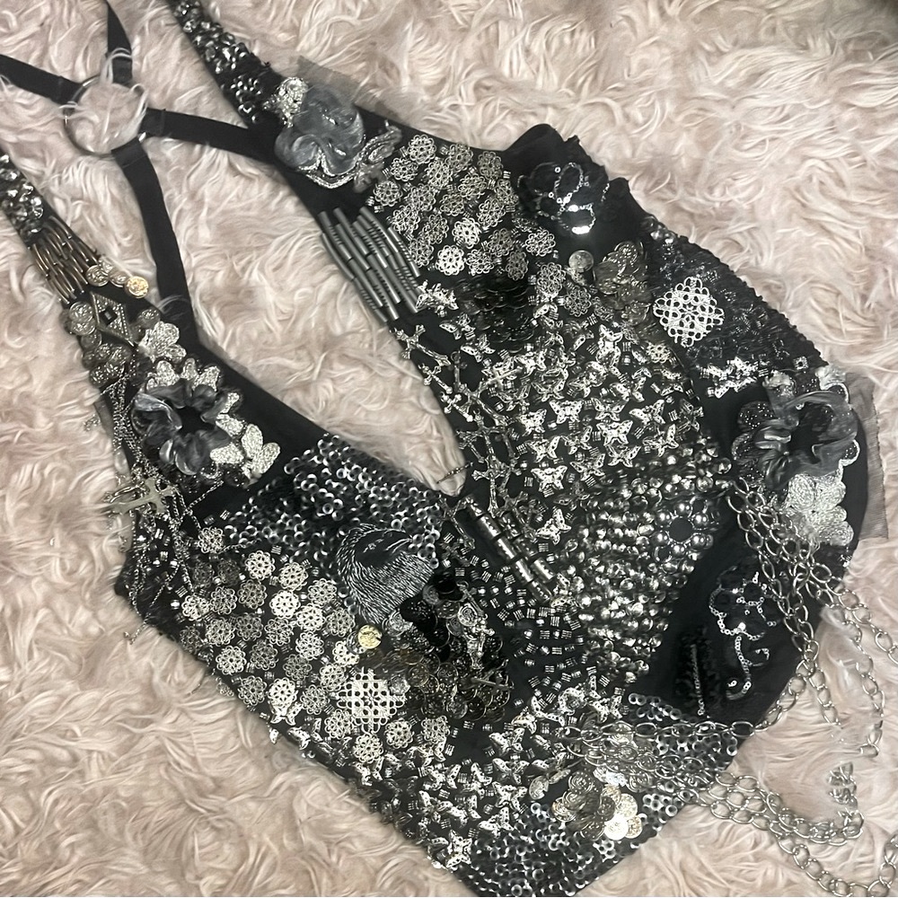 Insanely rare hand sewn cross covered backless vest